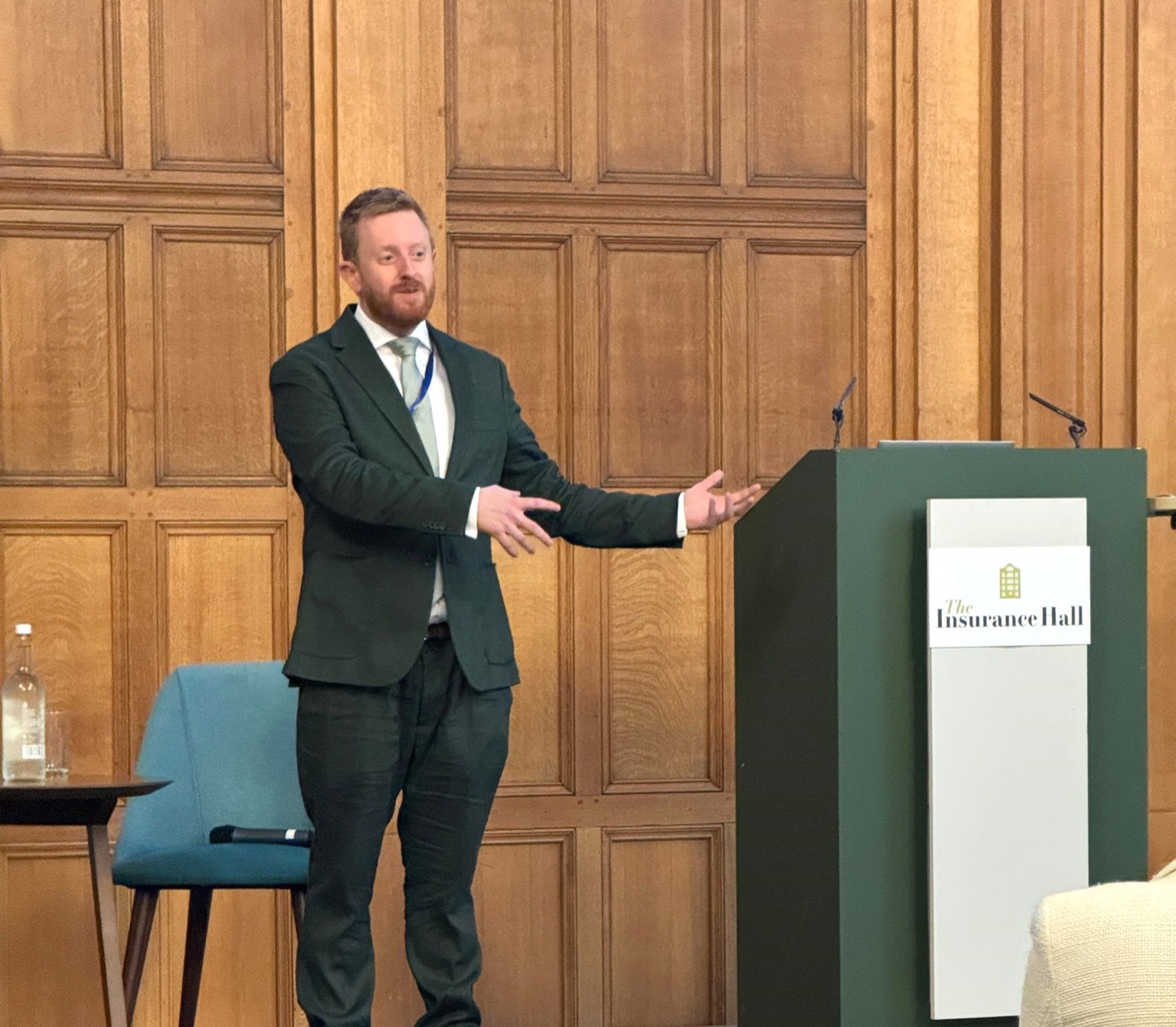 Dr Michael Palkowski chairing from the lectern