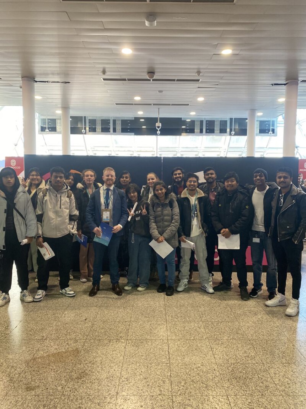 Dr Michael Palkowski with students on an industry visit